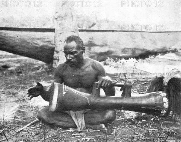 ''Indigene (Musicien) de la nouvelle-Guinee britannique; Les Terres Du Pacifique', 1914. Creator: Unknown.