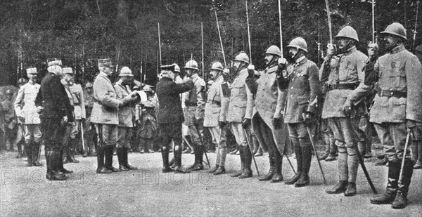 'La bataille de la Somme; M. Poincare decore des officiers de la 10e armee, commandee par..., 1916. Creator: Unknown.