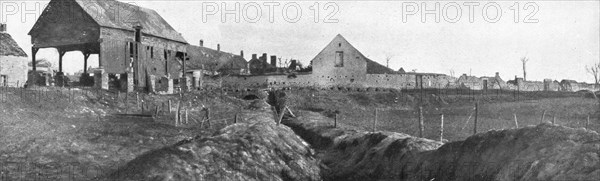 'A Perthes-les Hurlus; L'acces du village est defendu par des tranchees et de fil de fer', 1915. Creator: Unknown.