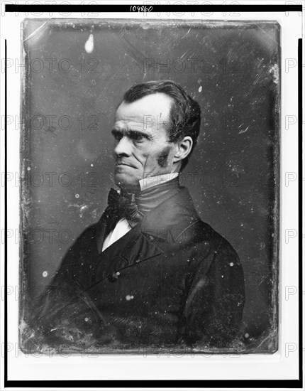 Unidentified man, half-length portrait, facing left, between 1844 and 1860. Creator: Mathew Brady.