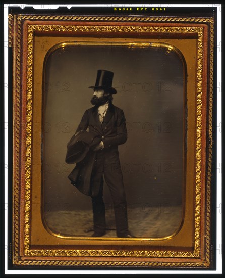 William Sidney Mount, full length portrait, facing left, wearing top hat..., between 1853 and 1860. Creator: Mathew Brady.