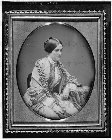 Ann Minerva "Nannie" Rodgers Macomb, three-quarter length portrait..., ca. 1850. Creator: Unknown.