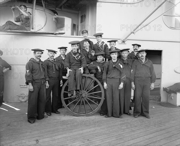 U.S.S. New York, a gun crew, anniversary of Santiago, 1899, 1899. Creator: Edward H Hart.