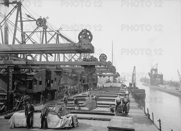 Unloading ore at Conneaut, Ohio, Brown conveying hoists, between 1900 and 1906. Creator: Unknown.