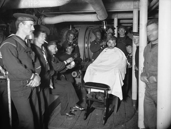 U.S.S. Brooklyn, barber shop, between 1896 and 1901. Creator: Unknown.