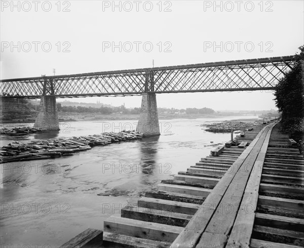 Eau Claire from the railroad bridge, between 1880 and 1899. Creator: Unknown.