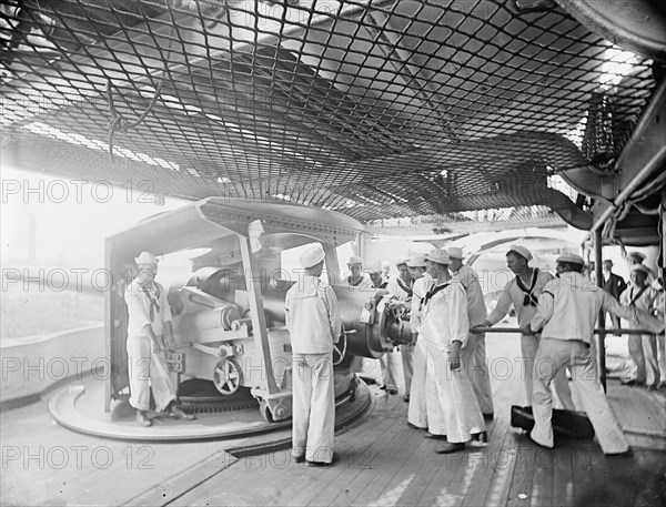 U.S.S. New York, 8 inch gun and crew, between 1893 and 1901. Creator: William H. Jackson.