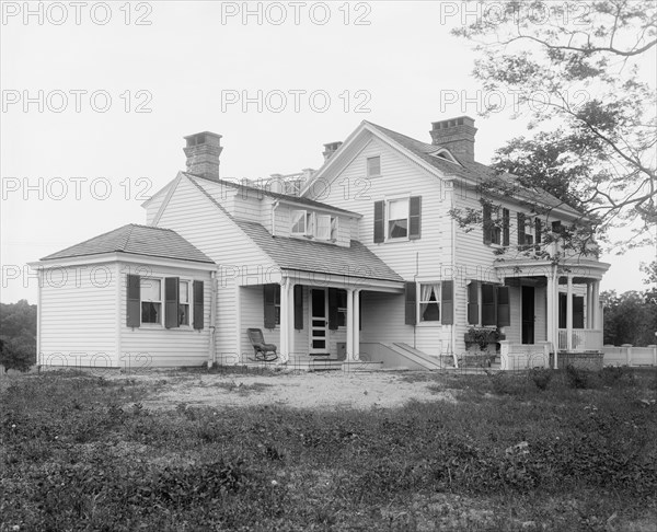 Calloway residence, back porch, with chair, Mamaroneck, N.Y., between 1900 and 1915. Creator: William H. Jackson.