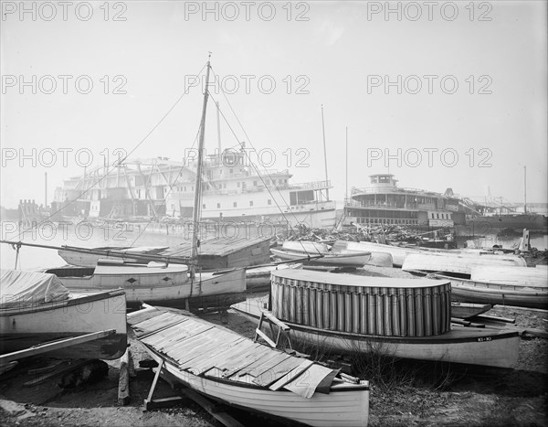 Old boats beached to rot away, New York City, between 1900 and 1910. Creator: Unknown.