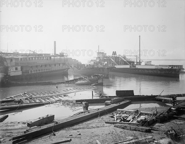 Old boats beached to rot away, New York City, between 1900 and 1910. Creator: Unknown.