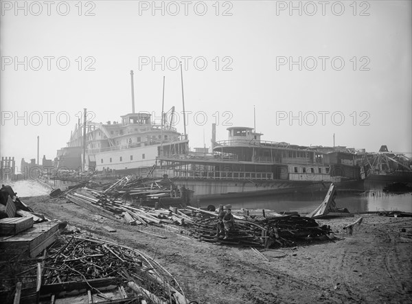 Old boats beached to rot away, New York City, between 1900 and 1910. Creator: Unknown.