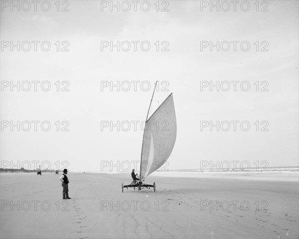 Sailing on the beach, Ormond, Fla., between 1900 and 1910. Creator: Unknown.