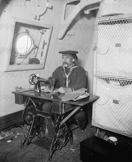 U.S.S. Brooklyn, ship's tailor, between 1896 and 1899. Creator: Unknown.