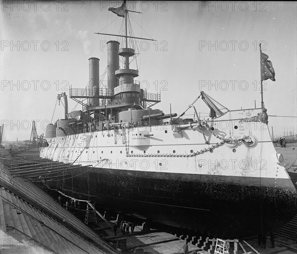 U.S.S. Iowa in dry dock, Brooklyn Navy Yard, between 1897 and 1901. Creator: Unknown.