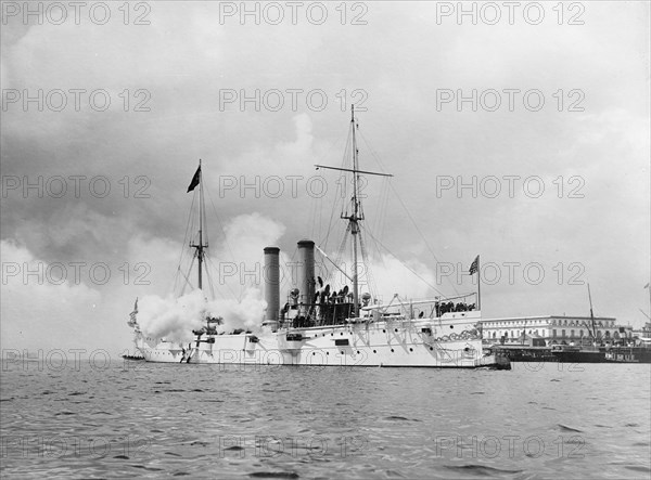 U.S.S. Montgomery firing last salute to Spanish flag at Havana, ca 1898. Creator: Unknown.