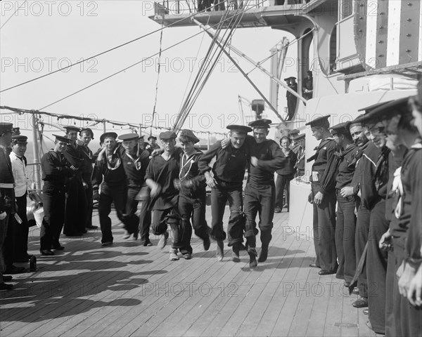 U.S.S. New York, 3 legged race, anniversary of Santiago, 1899 July 3. Creator: Unknown.