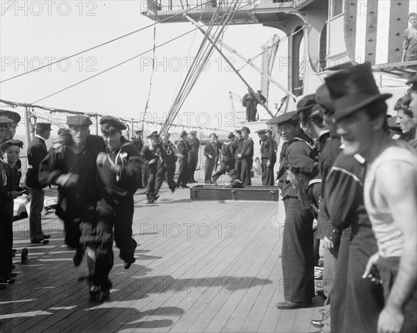 U.S.S. New York, 3 legged race, anniversary of Santiago, 1899 July 3. Creator: Unknown.