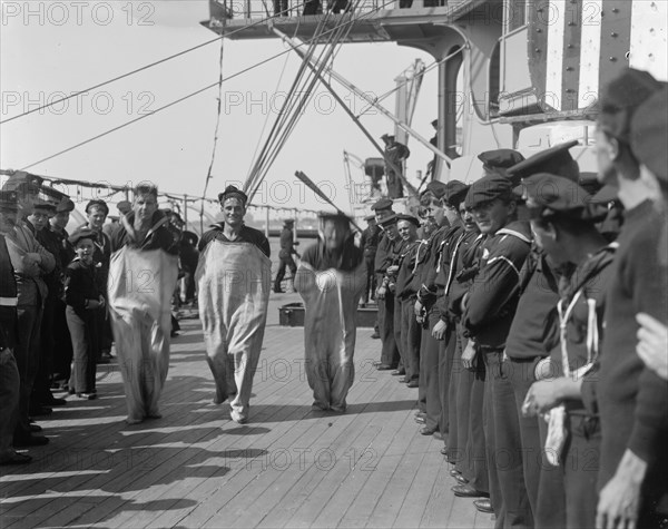 U.S.S. New York, sack race, anniversary of Santiago, 1899 July 3. Creator: Unknown.