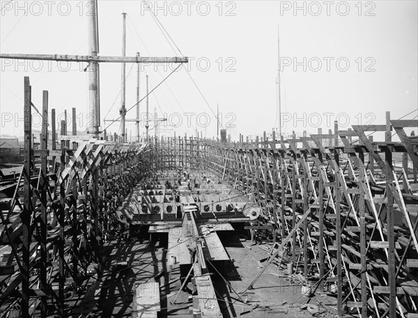 Laying keel of no. 400, Globe Iron Works, Cleveland, Ohio, ca 1900. Creator: Unknown.