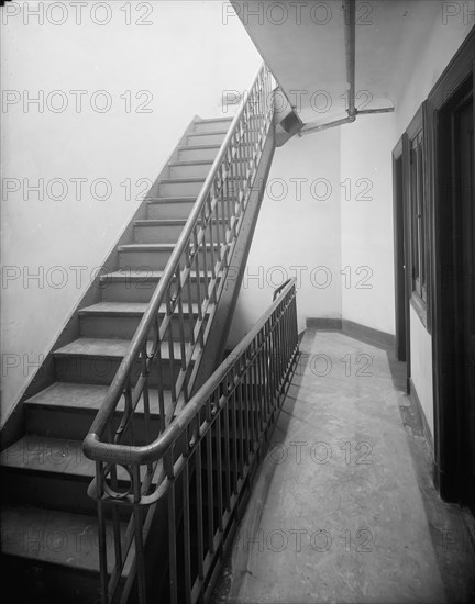 Stairway and hall, tenement, New York City, between 1900 and 1910. Creator: Unknown.