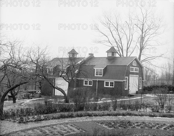 Carriage house and grounds at club, New York City, between 1900 and 1910. Creator: Unknown.