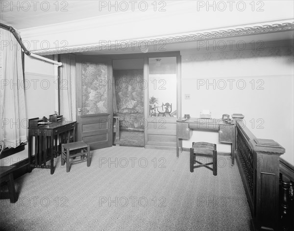 E.M. Bigsby Co. show rooms, private office from balcony, between 1900 and 1915. Creator: Unknown.