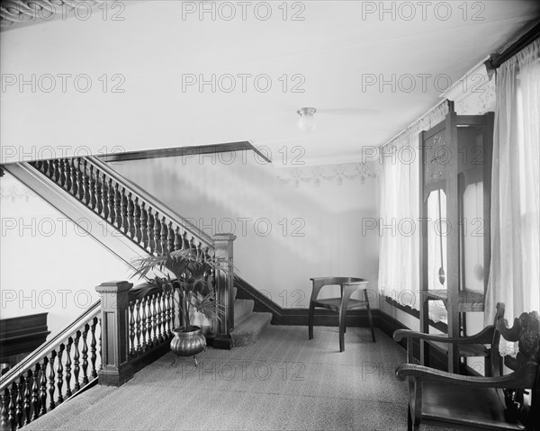 E.M. Bigsby Co. show rooms, clock on the balcony, between 1900 and 1915. Creator: Unknown.