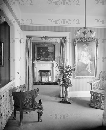 Room with painting of child, roses, and portiere, between 1900 and 1915. Creator: Unknown.