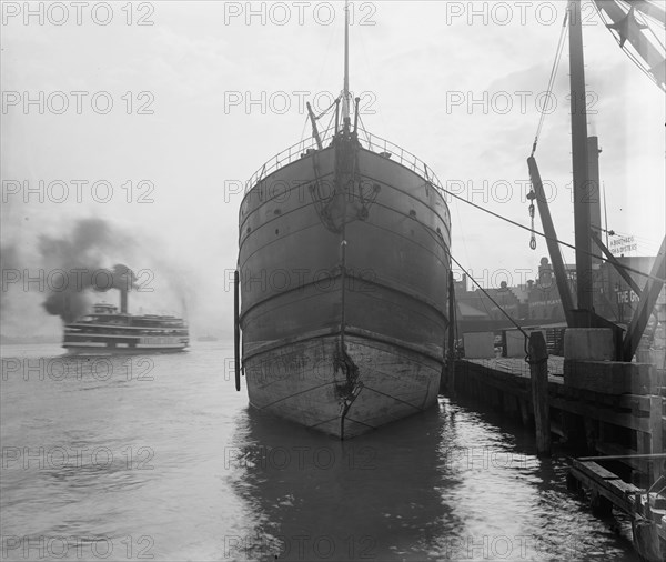 Unidentified freighter, Detroit, Michigan, with passenger steamer Britannia..., c1906-1915. Creator: Unknown.
