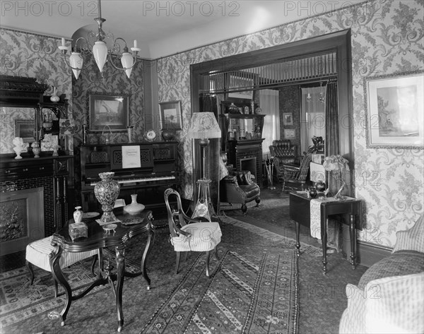 Douglas residence, parlors with arch between, Detroit, Mich., between 1905 and 1915. Creator: Unknown.