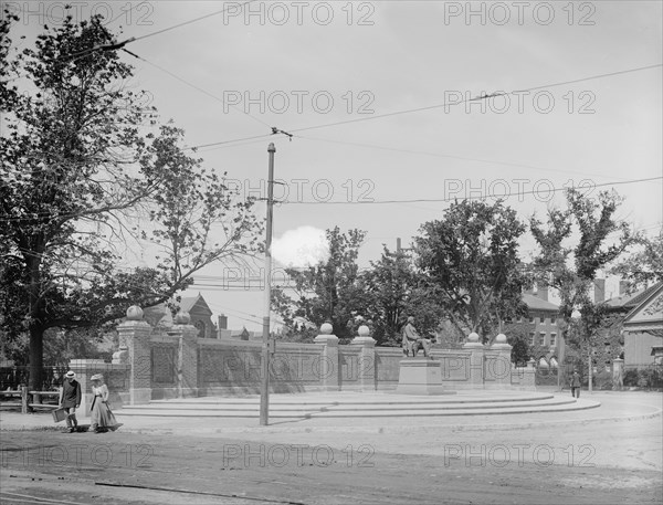 Charles Sumner statue at entrance to subway, Harvard Square, Cambridge, Mass., between 1900 and 1920 Creator: Unknown.