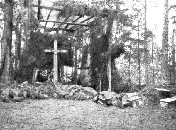 ''En Alsace; Une chapelle rustique dans la foret pour abriter nos morts', 1915. Creator: Unknown.