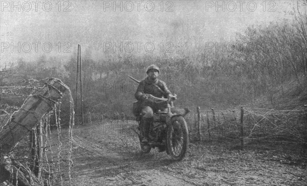 'A Travers la Fournaise; Un autre de ceux qui ont eu a coeur de remplir grandement..., 1916 (1924) Creator: Unknown.