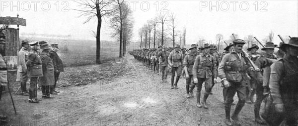 ''Aux armees Britanniques; Un defile de troupes canadiennes devant le general Joffre', 1916 (1924) Creator: Unknown.