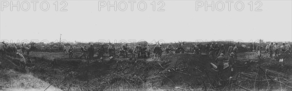 'En terre reconquise; Le retour des troupes d'assaut relevees: elles retrouvent..., 1916 (1924) Creator: Unknown.