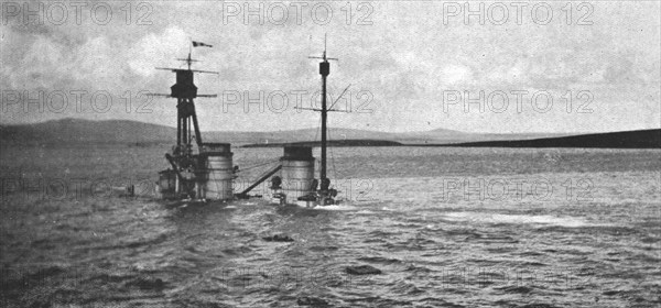 'Le sabordage de la flotte allemande; Le "Hindenburg" repose sur le fond; les cheminees..., 1919. Creator: Unknown.