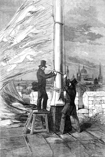 The Peace Rejoicings - Hoisting the Royal Standard at the Tower of London, 1856.  Creator: W Thomas.