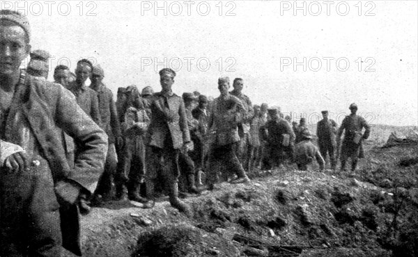 'Les combats de Douaumont; Prisonniers allemands amenes au poste de commandement..., 1916. Creator: Unknown.