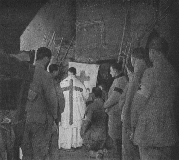 'Apres la reprise du Fort de Vaux; la premiere messe, dans une casemate du fort reconquis', 1916. Creator: Unknown.