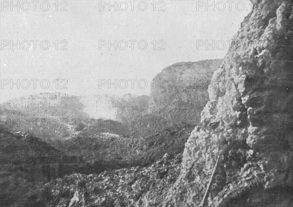 'Dans les forts reconquis de Douaumont et de Vaux; Fosse du fort de Douaumont et..., 1916. Creator: Unknown.