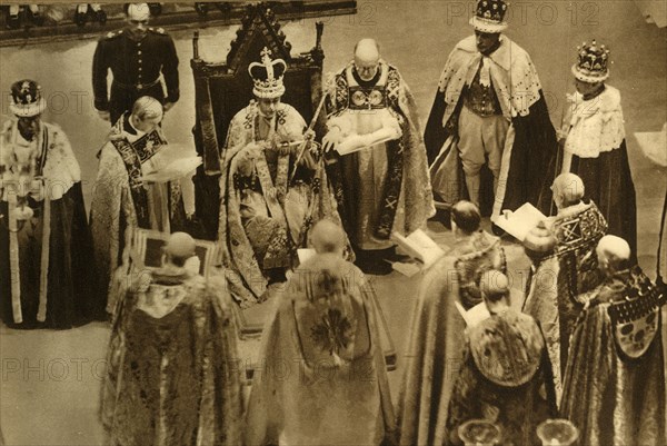 'The Crowned King George VI Seated on the Coronation Chair', 1937. Creator: Photochrom Co Ltd of London.