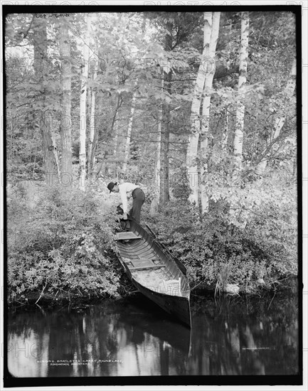 Bartlett's carry, Round Lake, Adirondack Mountains, (1902?). Creator: William H. Jackson.