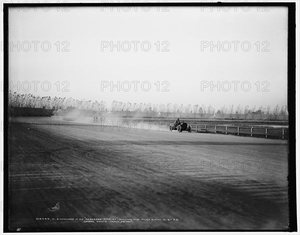 H.S. Harkness in his Mercedes-Simplex, winning five-miles event...Grosse Pointe track...c1902. Creator: Unknown.