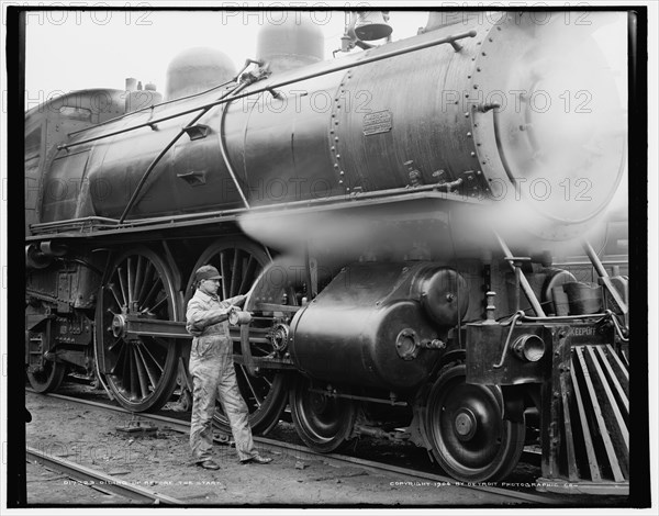 Oiling up before the start, c1904. Creator: Unknown.