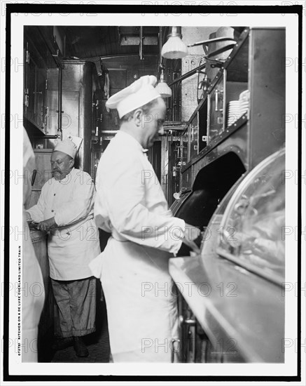 Kitchen on a deluxe overland limited train, between 1910 and 1920. Creator: Unknown.