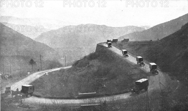 'Au Volant; Convoi automobile franchissant les Vosges pour descendre en Alsace', 1918. Creator: Unknown.