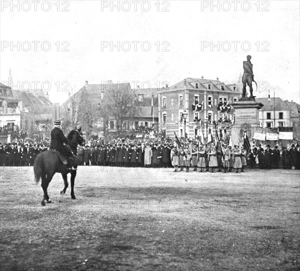 'Notre entrée a Colmar; Les generaux de Castelnau et Hirschauer passant devant...', 1918. Creator: Unknown.