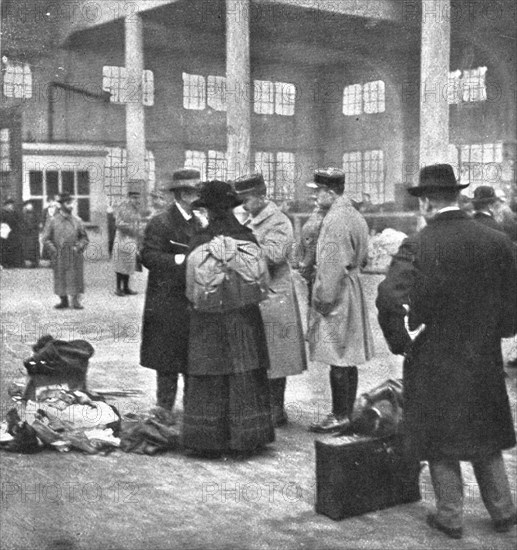 'Les Indesirables; Examen des pieces d'identite d'un professeur d'une ecole de Mulhouse..., 1918. Creator: Unknown.