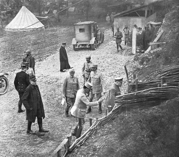 'M. Poincare, le Ministre de la Guerre et le general Joffre sur le front de la Somme; au..., 1916. Creator: Unknown.