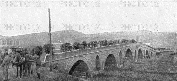 ''La rupture des lignes Bulgares; La traversee du grand pont de pierre sur la Bregalnitza..., 1918. Creator: Unknown.
